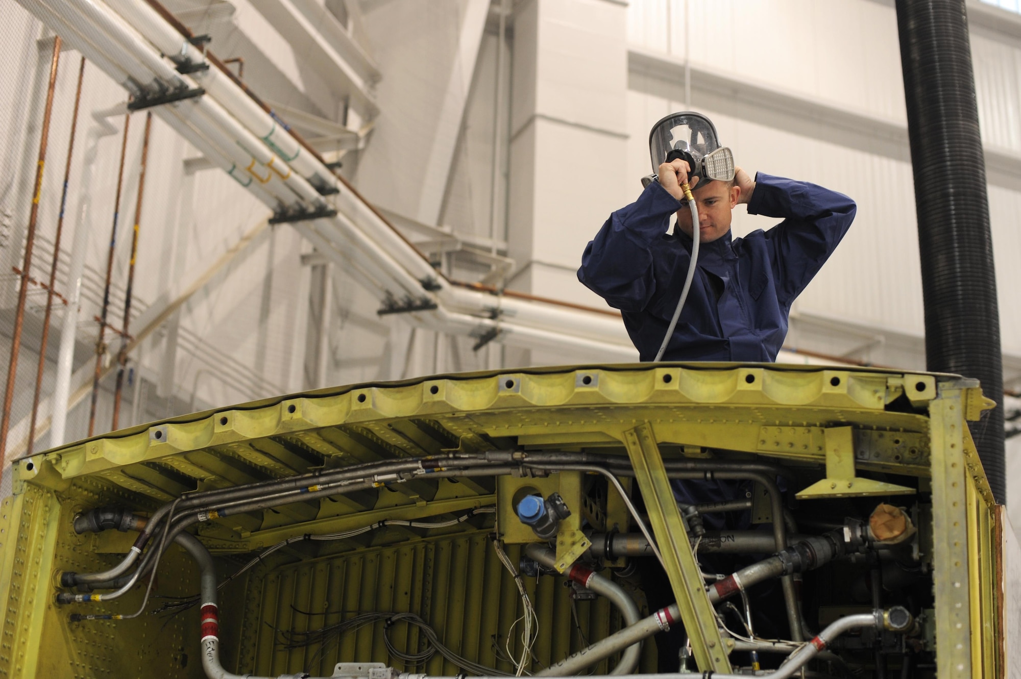 U.S. Air Force Senior Airman Timothy Thompson, 19th Maintenance Squadron Fuel Systems journeyman, prepares to enter a mock fuel tank March 29, 2017, at Little Rock Air Force Base, Ark. It’s the team’s responsibility to make repairs after a fuel leak is suspected. (U.S. Air Force photo by Airman 1st Class Grace Nichols)