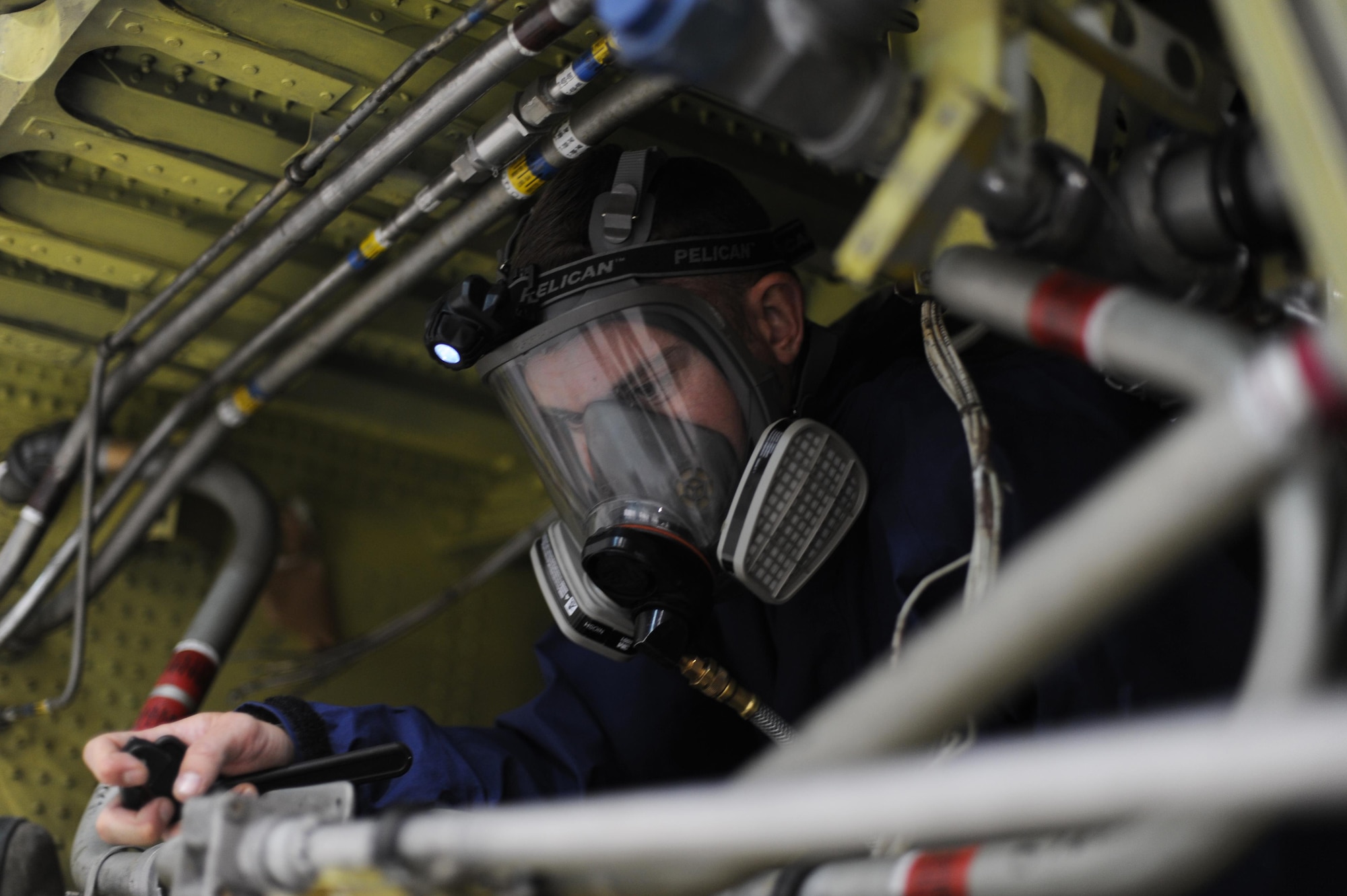 U.S. Air Force Senior Airman Timothy Thompson, 19th Maintenance Squadron Fuel Systems journeyman, uses a mock fuel tank to practice inspecting systems March 29, 2017, at Little Rock Air Force Base, Ark. When the team isn’t working on an aircraft, the focus is on training and honing their skills because fuel systems maintenance requires the highest attention to detail. (U.S. Air Force photo by Airman 1st Class Grace Nichols)