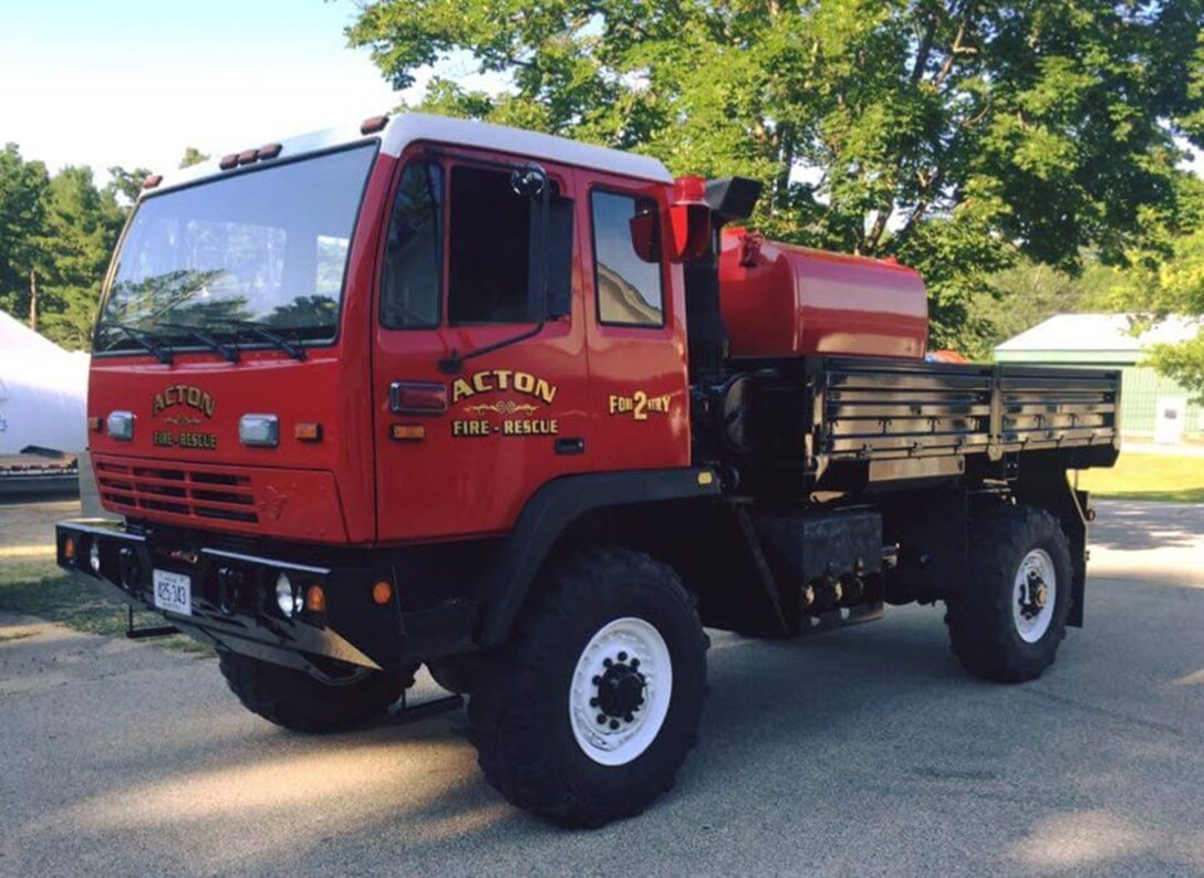A former tactical logistics vehicle stands ready to help Acton firefighters fight brush fires.