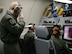 A member with more experience oversees two others during training, March 15, 2017, while flying over the Pacific Northwest. The AWACS worked with F-15s and other aircraft for realistic training scenarios during their time at Mountain Home Air Force Base, Idaho. (U.S. Air force photo by Senior Airman Jessica H. Smith)