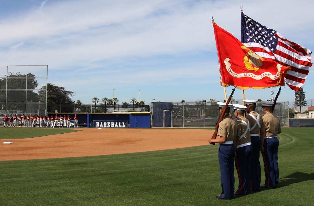 Marine Corps Recruiters of Substation Lakewood present colors during a varsity baseball game at St. John Bosco High School, Bellflower, Calif., March 14, 2017.