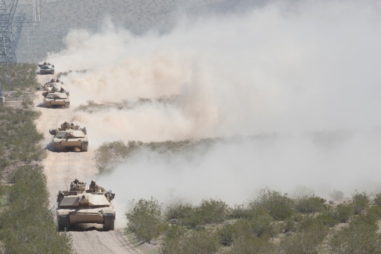 M1A1 Abrams Main Battle Tanks with 1st Tank Battalion cross into Marine Corps Air Ground Combat Center, Twentynine Palms, Calif., during Exercise Desert March, March 27, 2017. He exercise was made to test the battalion’s capabilities in handling a long distance movement as well as test the battalion’s capabilities of logistically supporting the battalion throughout the exercise.  (U.S. Marine Corps photo by Cpl. Thomas Mudd)