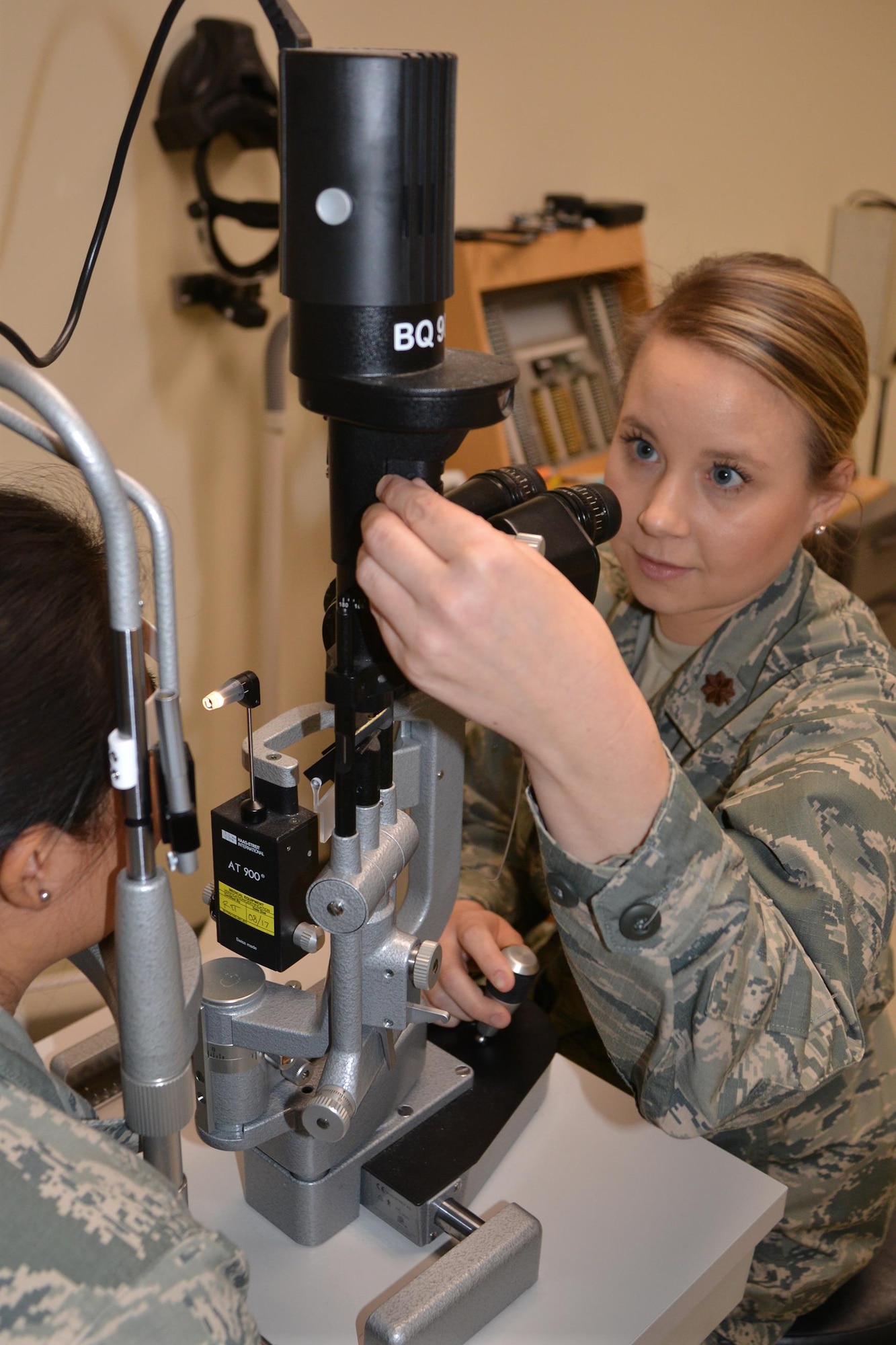 Maj. Kara Reynolds, 477th Aerospace Medicine Flight Chief of Optometry, participates in training activities with Senior Airman Andrea Jaque-Baez during the unit training assembly at Joint Base Elmendorf-Richardson, Alaska Mar. 4-5, 2017. (U.S. Air Force photo by Staff Sgt. Mike Campbell)