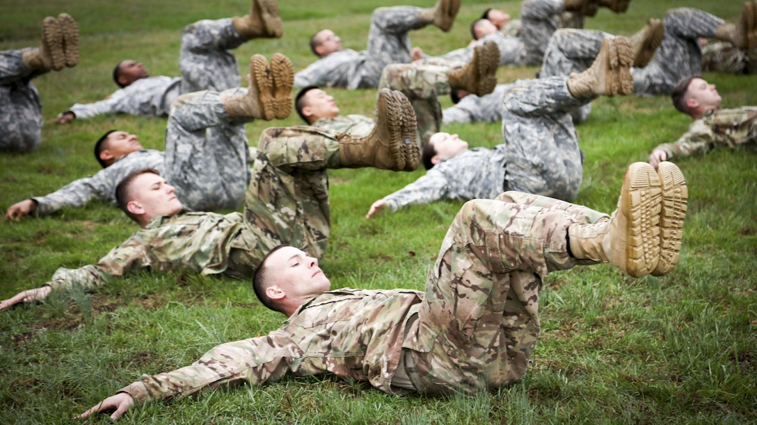 Army Sgt. Scott Cox and other candidates for the Regional Health Command - Atlantic's Best Warrior Competition perform physical readiness training at Fort Campbell, Ky., March 28, 2017. Army photo by David E. Gillespie