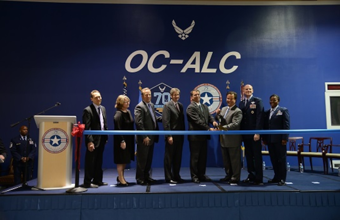 (second from right) DLA Energy Commander Air Force Brig. Gen. Martin Chapin along with Oklahoma City Air Logistics Complex senior officials cut the ceremonial ribbon signifying the Air Force’s largest energy savings performance contract at Tinker Air Force Base, Oklahoma, March 29. Photo by Kelly White. The largest energy savings contract in Air Force history is projected to save $626 million in energy and operational costs over 21 years. 