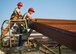 Senior Airman Paige Rodgers and Staff Sgt. Keny Drescher-Brown, 823rd Red Horse Squadron, position a beam into place March 23 during a construction project at Eglin Air Force Base, Fla. The 96th Civil Engineer Group’s open air pavilion is one of many troop training projects the 823rd RHS will complete for the Department of Defense, the Air Force and the local community to maintain their skills until the next deployment. (U.S. Air Force photo/Ilka Cole)