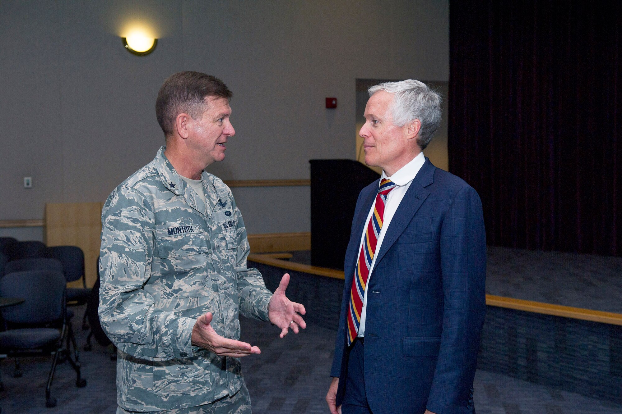 Brig. Gen. Wayne Monteith, 45th Space Wing commander, and Joseph Grenny, social scientist for business performance, engage in conversation March 30, 2017, after the 45th Force Support Squadron’s Leadership Speaker Series at Patrick Air Force Base, Fla. Grenny was the keynote speaker at the event and taught audience members how to have crucial conversations and achieve positive results. (U.S. Air Force photo by Phil Sunkel) 