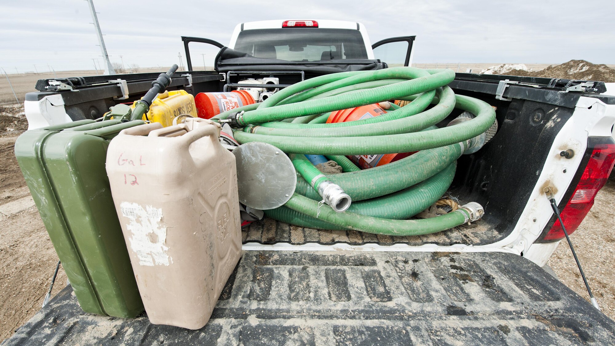 A truck holds the 91st Missile Maintenance Squadron electromechanical team’s flood-gear near Bowbells, N.D., March 29, 2017. Airmen from across the 91st Missile Wing surveyed and drained flood-water from the missile complex sites. (U.S Air Force photo/Senior Airman J.T. Armstrong)