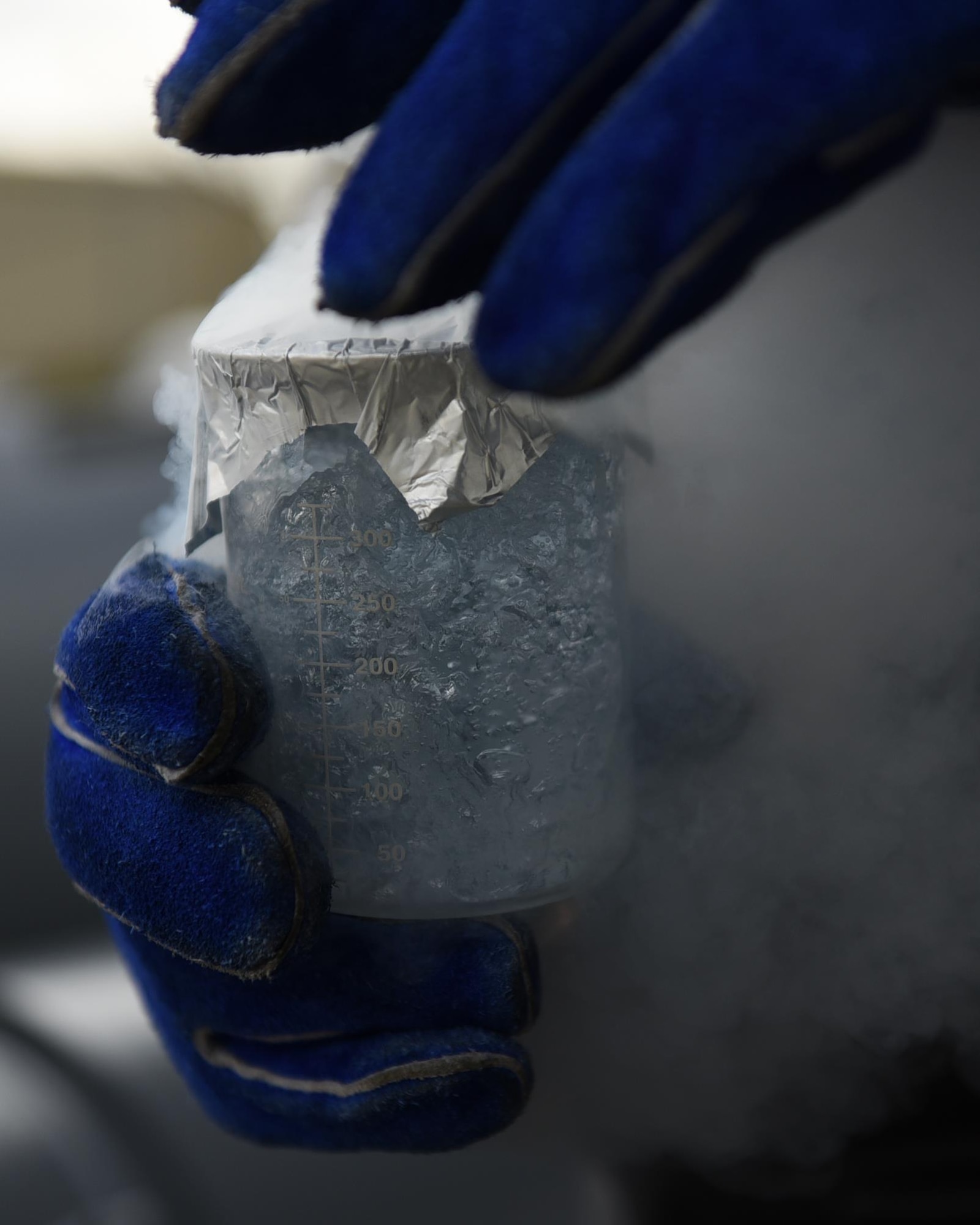 Liquid oxygen, or LOX, is pressurized oxygen that has been cooled to minus 297 degrees Fahrenheit, turning it into a boiling liquid with a pale blue color. In liquid form, it’s transported more efficiently from holding containers to aircraft. (U.S. Air Force photo by Airman 1st Class Kevin Sommer Giron)