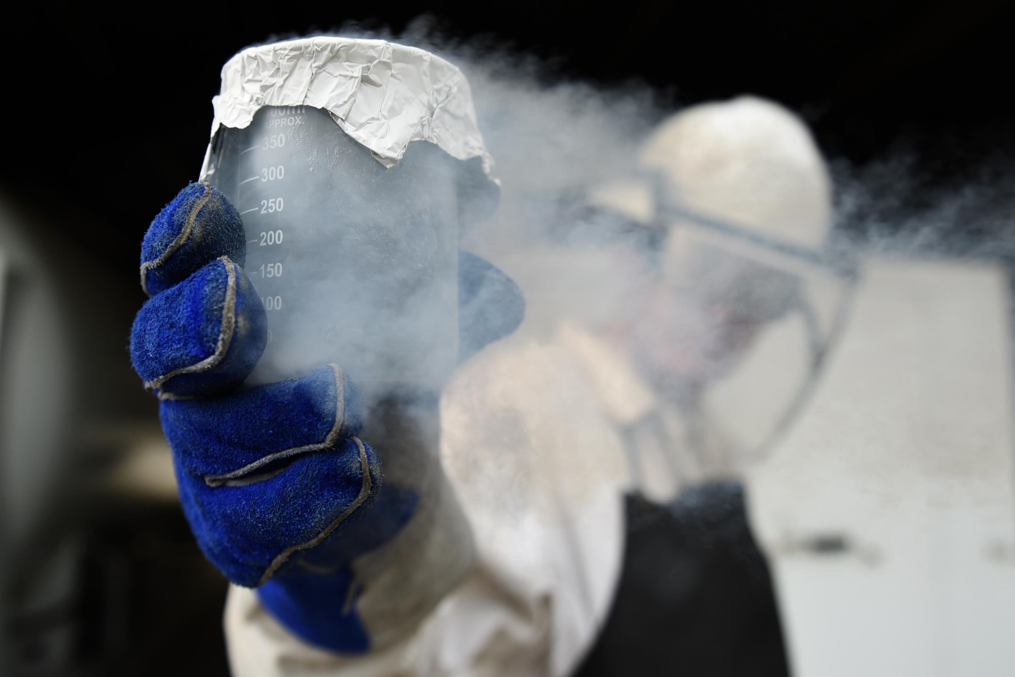 U.S. Air Force Senior Airman Jesse Frady, 19th Logistics Readiness Squadron fuel cryogenics journeyman, takes a sample of liquid oxygen, or LOX, for odor testing March, 28, 2017, at Little Rock Air Force Base, Ark. Before the oxygen makes its way to pilots, Frady uses an odor sample beaker with filter paper to test for contamination. (U.S. Air Force photo by Airman 1st Class Kevin Sommer Giron)