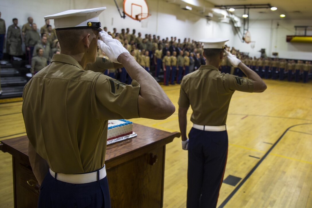 Marines with Marine Barracks Washington D.C., salute as the National Anthem is played by the Marine Corps Band during the MBW birthday ceremony at Marine Barracks Washington, D.C., March 31, 2017. Marine Barracks Washington, D.C., also known as "8th & I," is the oldest active post in the Marine Corps. It was founded by President Thomas Jefferson and Lt. Col. William Ward Burrows, the second commandant of the Marine Corps, in 1801. Each year the Marines of MBW celebrate the establishment of the “Oldest Post of the Corps” and will continue with this tradition for many years to come. (U.S. Marine Corps photo by Lance Cpl. Damon A. Mclean/Released)
