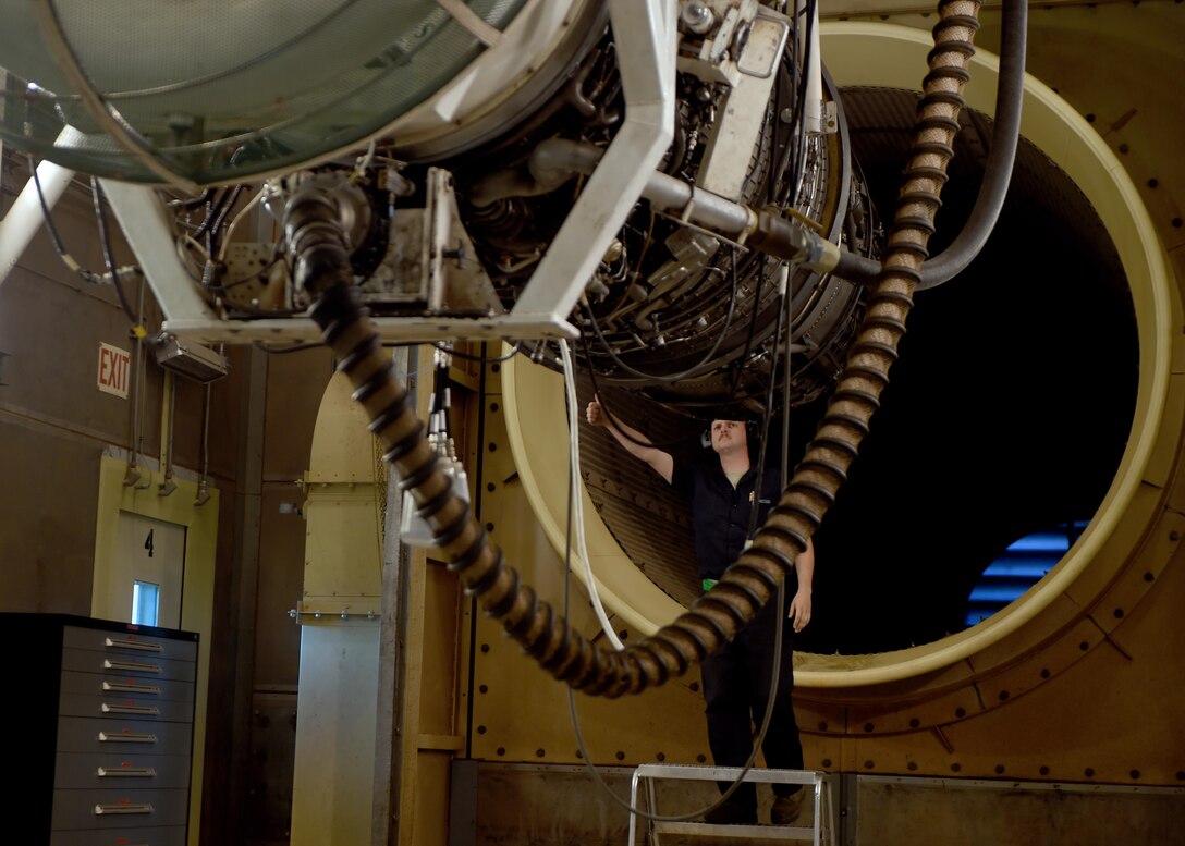 U.S. Air Force Staff Sgt. Kevin Ludwig, 7th Component Maintenance Squadron, inspects the augmenter of a F-101-GE-102 engine at Dyess Air Force Base, Texas, March 30, 2017. After being ran through a function test engines are given a safety check and minor hands-on inspections. (U.S. Air Force Senior Airman Alexander Guerrero)