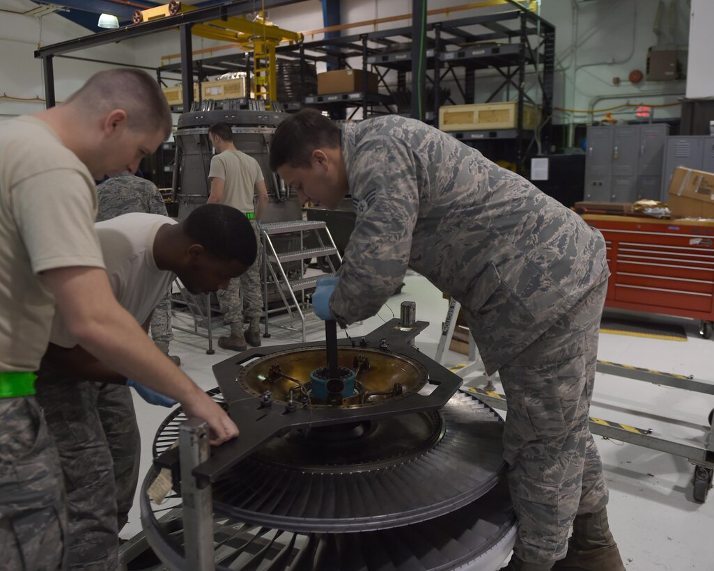 U.S. Air Force Airmen assigned to the 7th Component Maintenance Squadron, install a bearing into a fan rotor at Dyess Air Force Base, Texas, March 30, 2017. The Airmen of the accessory maintenance section perform maintenance on augmenters, fans, and the low pressure turbines of the B-1B Lancer engine. (U.S. Air Force Senior Airman Alexander Guerrero)