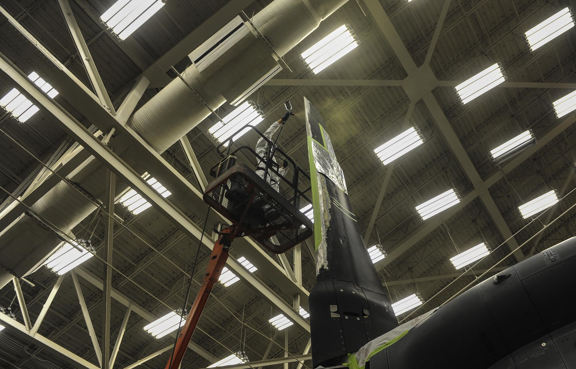 Airman 1st Class Logan Winningham, an aircraft structural maintainer with the 1st Special Operations Maintenance Squadron, sprays primer onto a CV-22 Osprey propeller at Hurlburt Field, Fla., March 29, 2017. Primer is applied after the old paint is sanded and wiped away. (U.S. Air Force photo by Airman 1st Class Isaac O. Guest IV)