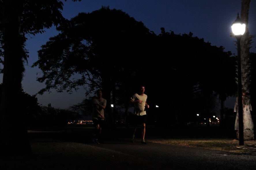 Volunteers jog on the running path overlooking Pearl Harbor during the 6th Annual Tactical Air Control Party (TACP) Association’s Remembrance Run on Joint Base Pearl Harbor-Hickam, Hawaii, March 30, 2017.  Members of the 25th Air Support Operations Squadron organized and participated in a 24-hour run challenge.  The TACP Association seeks to “remember the fallen, honor the living, and aid brothers in need,” by providing support to TACPs who were wounded and assisting the families of those killed in action.  The event is held world-wide, with every TACP unit starting the run at noon local time.  (U.S. Air Force photo by Tech. Sgt. Heather Redman)