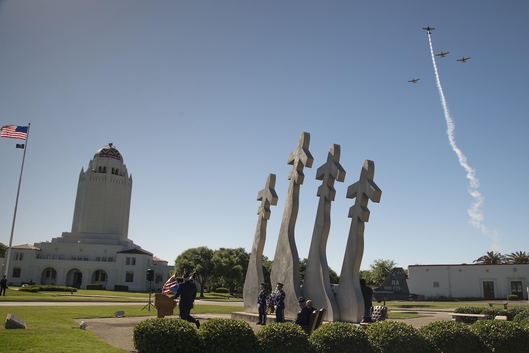 A formation of T-34 Mentors perform a missing man flyover during the Freedom Flyer Reunion wreath laying ceremony March 31, 2017, at Joint Base San Antonio-Randolph, Texas. The event honors all prisoners of war and missing in action service members from the Vietnam War and included a wreath-laying ceremony and a missing man formation flyover.  (U.S. Air Force photo by Sean M. Worrell) 