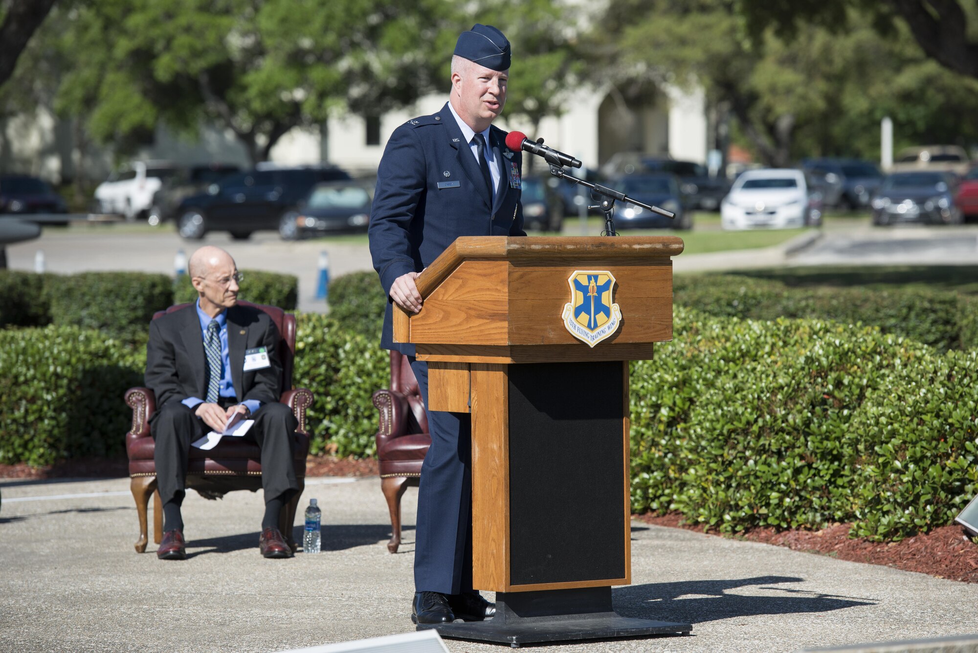 Col. Joel Carey, 12th Flying Training Wing commander, speaks during the Freedom Flyer Reunion wreath laying ceremony March 31, 2017, at Joint Base San Antonio-Randolph, Texas. The event honors all prisoners of war and missing in action service members from the Vietnam War and included a wreath-laying ceremony and a missing man formation flyover.  (U.S. Air Force photo by Sean M. Worrell) 