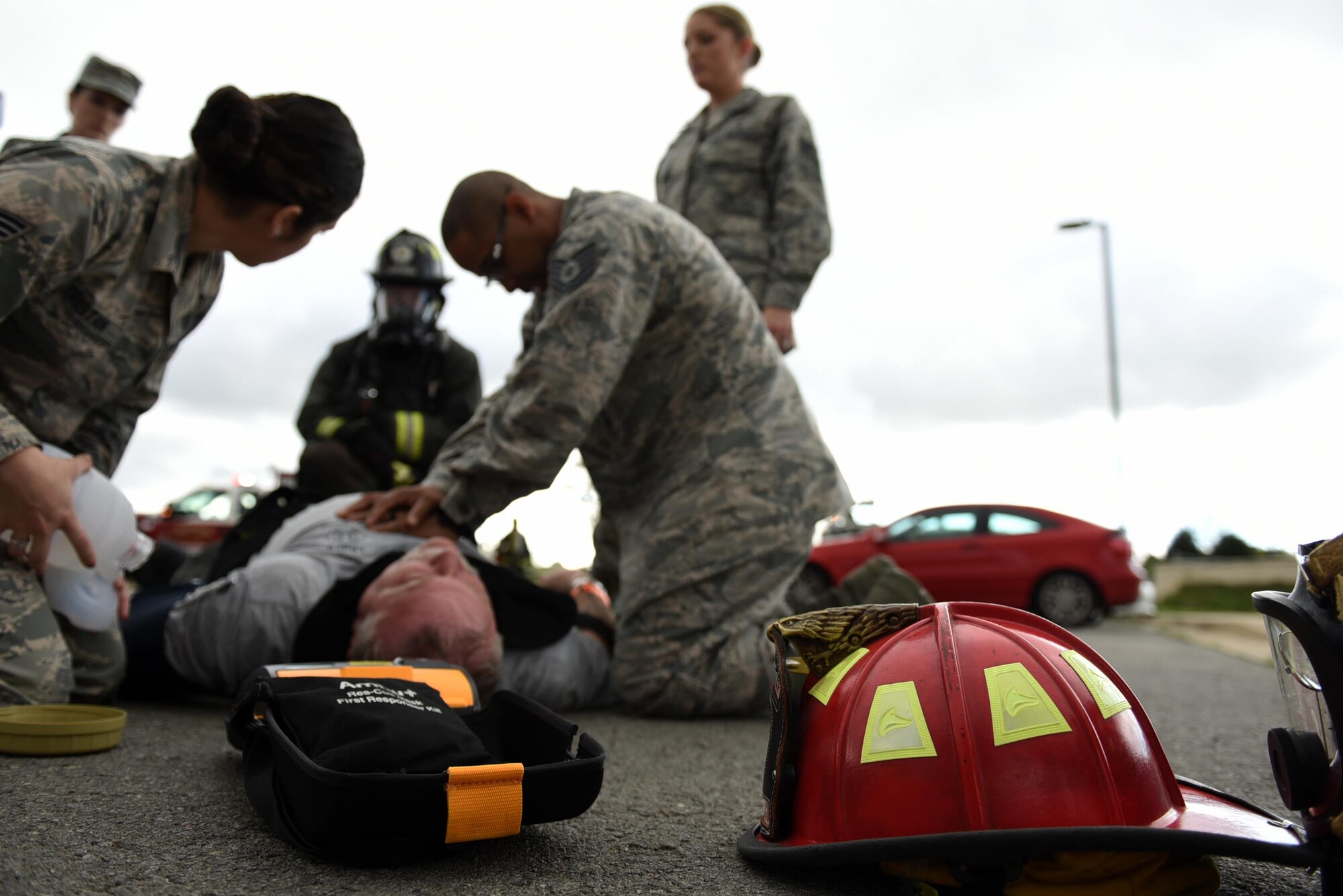 Members of the 19th Aerospace Medicine Squadron perform chest compressions during a major accident response inspection March 30, 2017, at the Jacksonville Fire Department Training Center, Ark. The 19th AMDS response team was responsible for stabilizing patients, checking their vitals, and coordinating transfers to the emergency room. (U.S. Air Force photo by Airman 1st Class Kevin Sommer Giron)