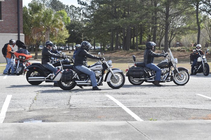 U.S. Air Force Col. Jimmy Canlas, 437th Airlift Wing commander, speaks during an annual motorcycle safety briefing March 31, 2017, at Joint Base Charleston, South Carolina. The event covered the importance of risk management, personal protective equipment, training requirements and opportunities as well as mentorship programs. The event also featured a motorcycle judging competition and a ride led the by the Green Knights military motorcycle group.