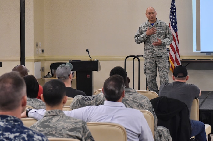 U.S. Air Force Col. Jimmy Canlas, 437th Airlift Wing commander, speaks during an annual motorcycle safety briefing March 31, 2017, at Joint Base Charleston, South Carolina. The event covered the importance of risk management, personal protective equipment, training requirements and opportunities as well as mentorship programs. The event also featured a motorcycle judging competition and a ride led the by the Green Knights military motorcycle group.