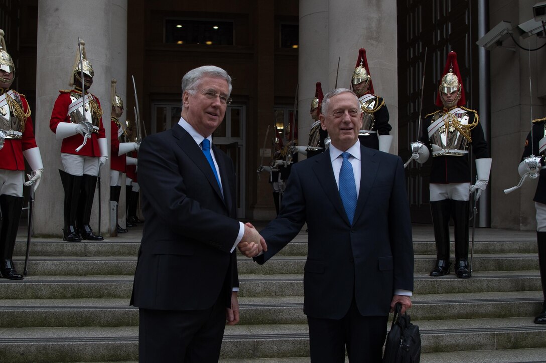 Defense Secretary Jim Mattis shakes hands with British Defense Secretary Michael Fallon at arrival ceremony at the Defense Ministry in London, March 31, 2017. DoD photo by Army Sgt. Amber I. Smith