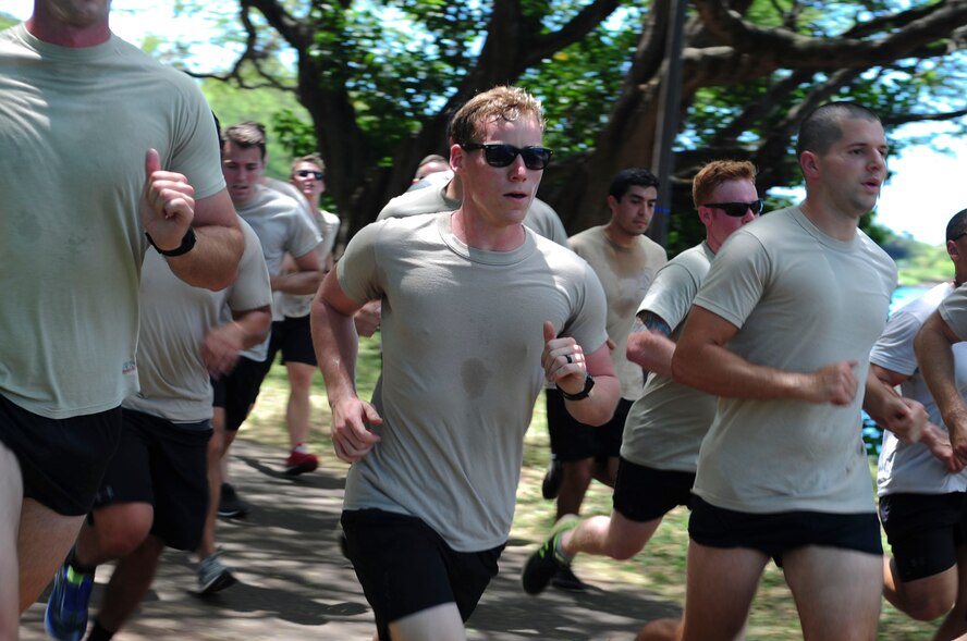 Volunteers jog on the running path overlooking Pearl Harbor during the 6th Annual Tactical Air Control Party (TACP) Association’s Remembrance Run on Joint Base Pearl Harbor-Hickam, Hawaii, March 30, 2017.  Members of the 25th Air Support Operations Squadron organized and participated in a 24-hour run challenge.  The TACP Association seeks to “remember the fallen, honor the living, and aid brothers in need,” by providing support to TACPs who were wounded and assisting the families of those killed in action.  The event is held world-wide, with every TACP unit starting the run at noon local time.  (U.S. Air Force photo by Tech. Sgt. Heather Redman)