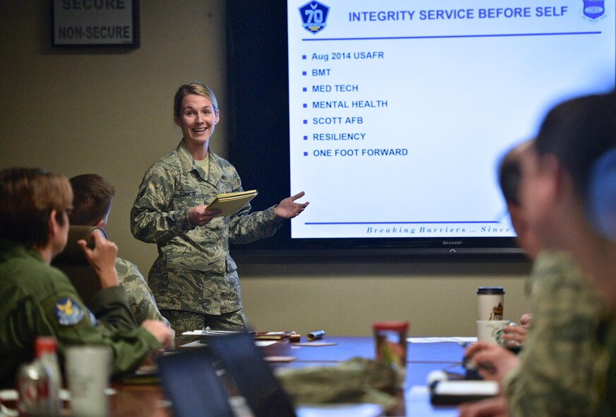 Senior Airman Hillary Haynes, mental health technician with the 932nd Medical Squadron speaks to 932nd Airlift Wing group and squadron commanders as well as senior enlisted members as part of the Airman spotlight briefing during the pre unit training assembly meeting, March 31, 2017, Scott Air Force Base, Illinois. Haynes was flattered by the opportunity to share her story. She focused on resiliency through personal and career challenges. "Stay resilient, stand out on top," said Haynes, who would like to achieve the rank Chief Master Sgt. someday.  (U.S. Air Force photo by Christopher Parr)