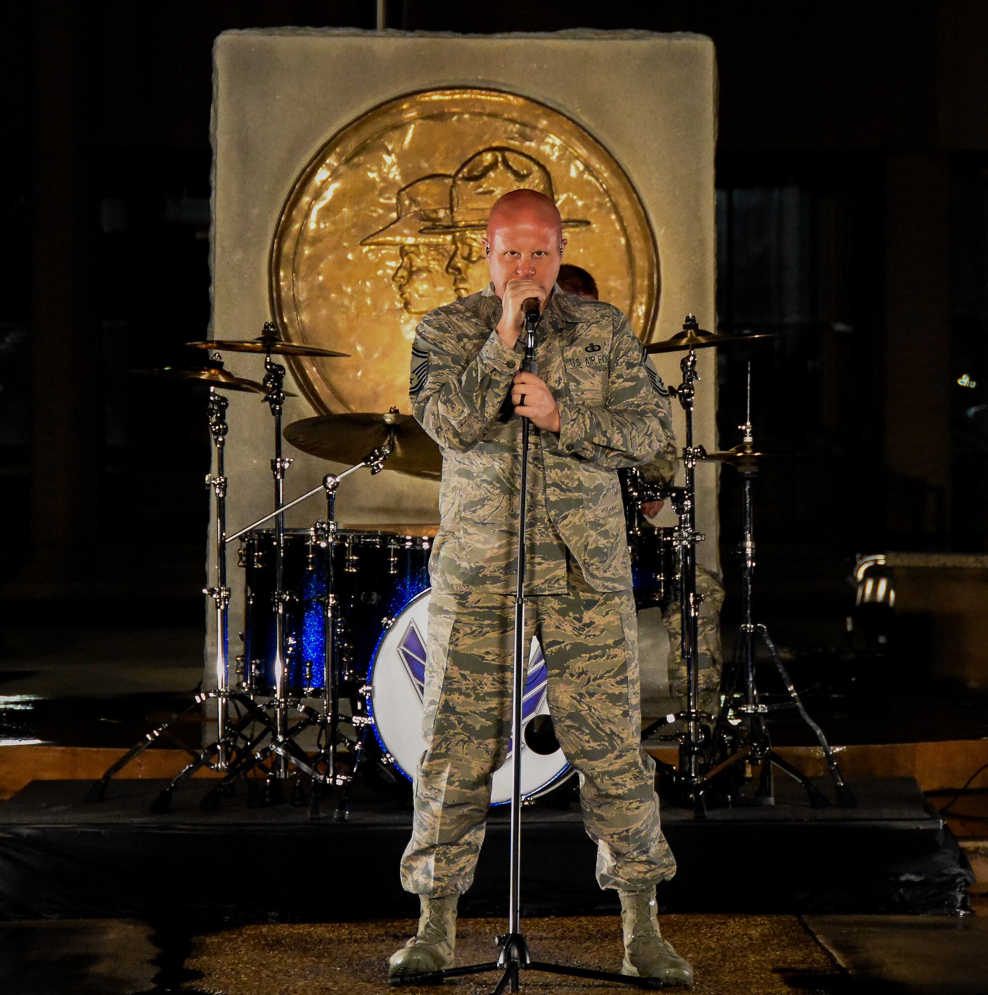 Senior Master Sgt. Ryan Carson belts out the vocals to the new single by Max Impact, Find You,” while on location at Joint Base San Antonio, TX. The video is set to be released on May 1, 2017. (Photo by Technical Sgt. Chad Randolph) 