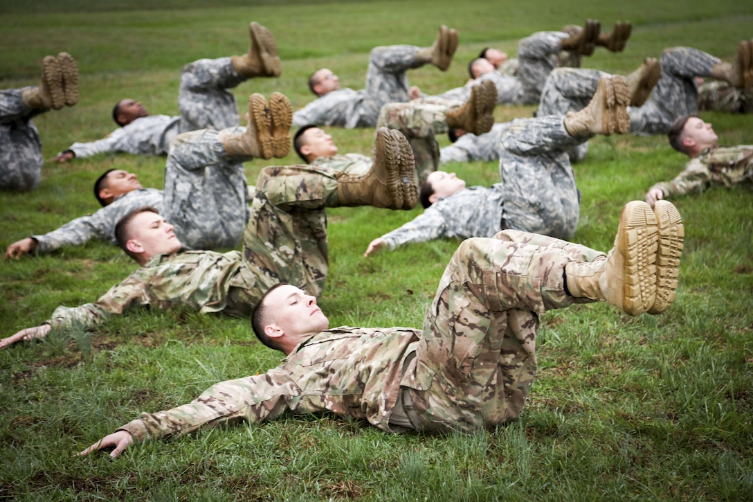 Army Sgt. Scott Cox and other candidates for the Regional Health Command - Atlantic's Best Warrior Competition perform physical readiness training at Fort Campbell, Ky., March 28, 2017. Army photo by David E. Gillespie