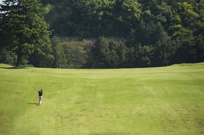 A participant in the 4th Annual Active-Duty Fund Drive in support of the Navy-Marine Corps Relief Society Golf Tournament drives a ball at the Iwakuni Country Club in Iwakuni City, Japan, April 28, 2017. The tournament raised funds for the NMCRS, which provides emergency financial assistance to active-duty and retired Navy and Marine Corps personnel and their families. (U.S. Marine Corps photo by Pfc. Stephen Campbell)