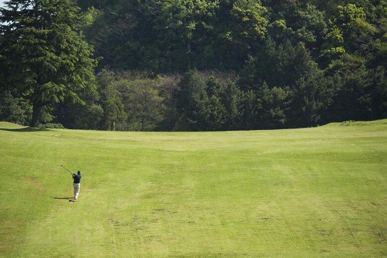 A participant in the 4th Annual Active-Duty Fund Drive in support of the Navy-Marine Corps Relief Society Golf Tournament drives a ball at the Iwakuni Country Club in Iwakuni City, Japan, April 28, 2017. The tournament raised funds for the NMCRS, which provides emergency financial assistance to active-duty and retired Navy and Marine Corps personnel and their families. (U.S. Marine Corps photo by Pfc. Stephen Campbell)