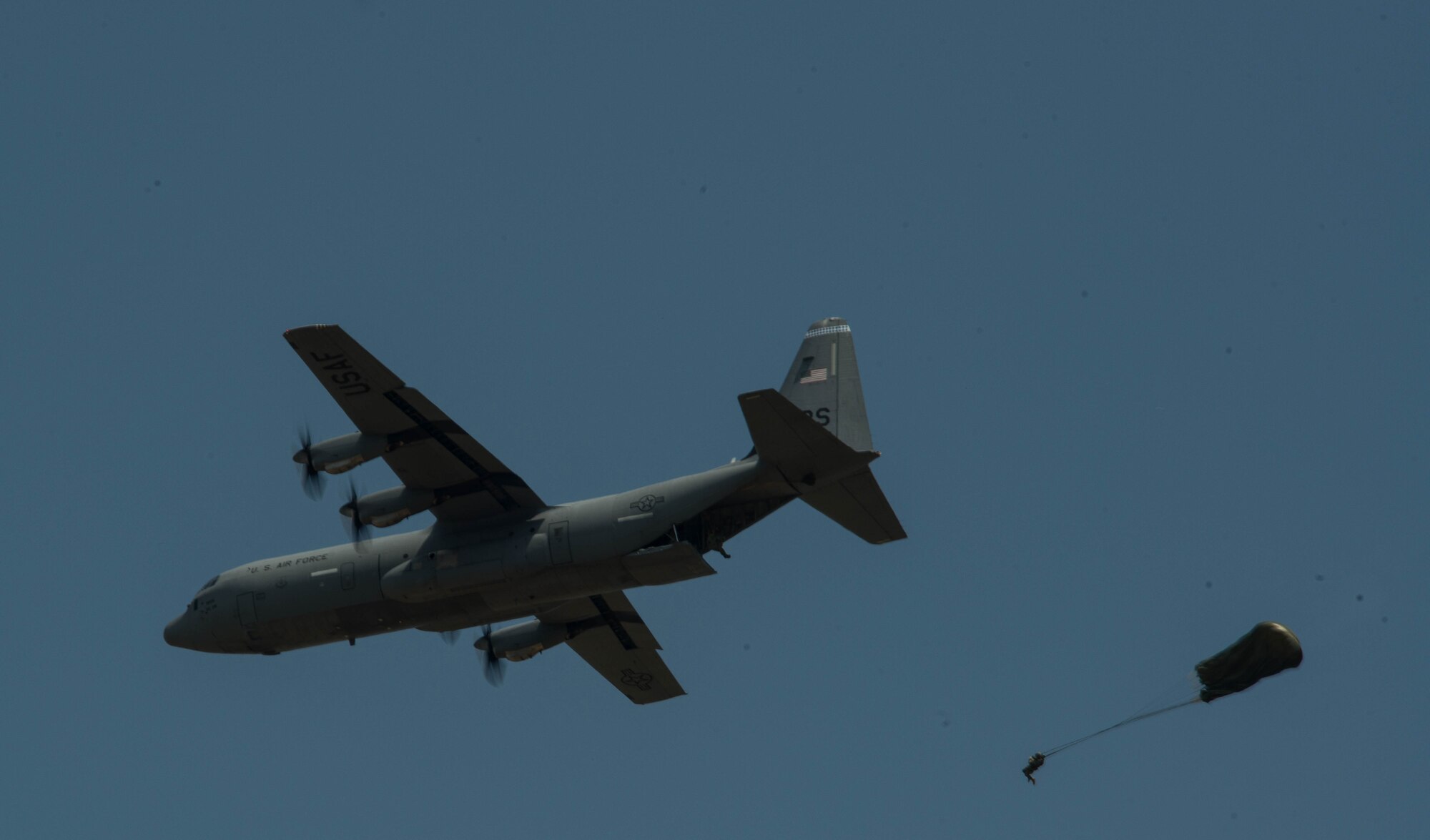 A Greek paratrooper conducts a static-line jump out of a U.S. Air Force C-130J Super Hercules during Exercise Stolen Cerberus IV above Megara, Greece, April 22, 2017. Throughout the exercise, 265 Greek paratroopers conducted static-line and military free-fall jumps form U.S. aircrafts. As NATO allies, the U.S. and Greece share a commitment to promote peace and stability, and seek opportunities to continue developing their strong relationship. (U.S Air Force photo by Senior Airman Tryphena Mayhugh)