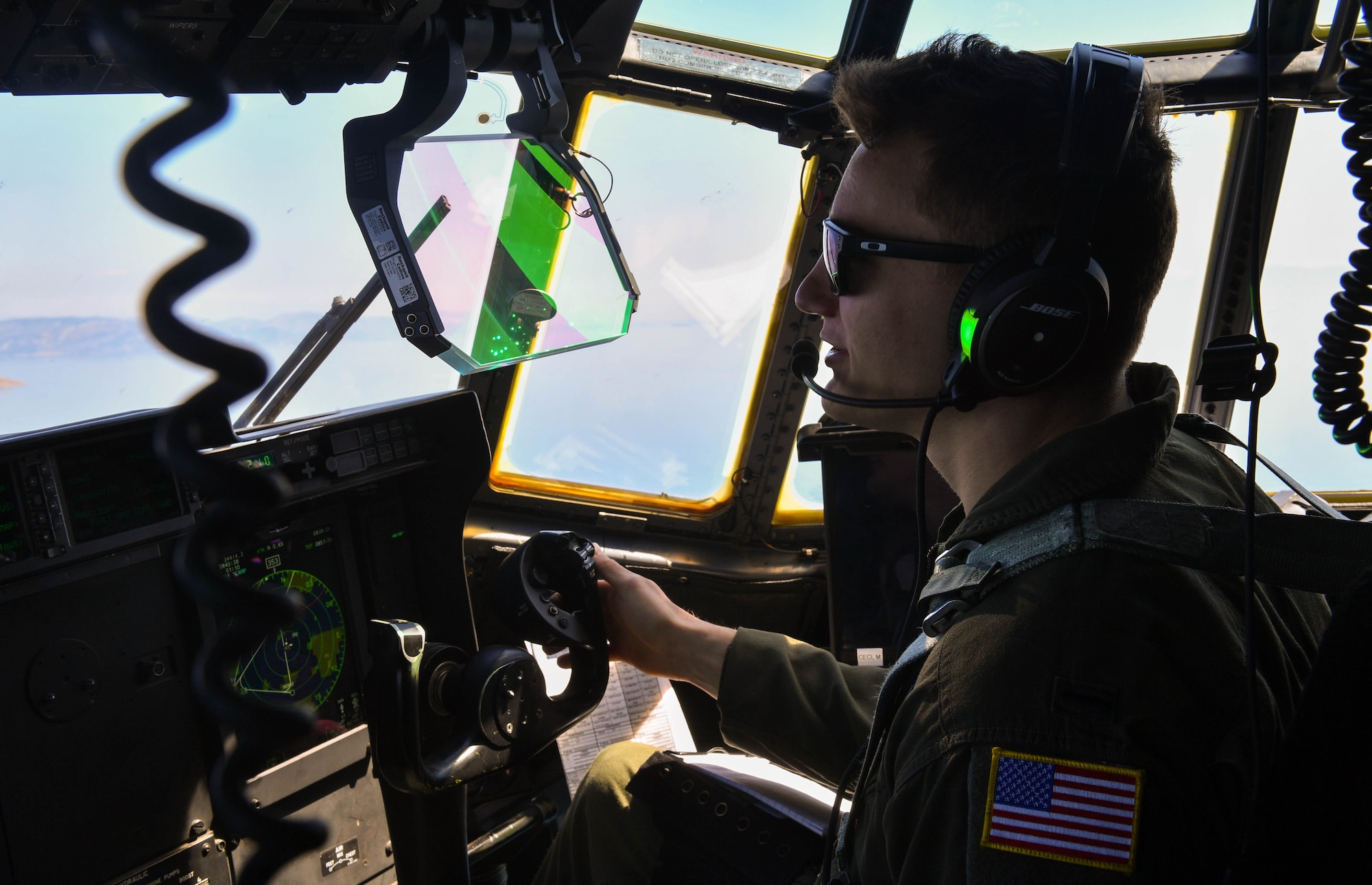U.S. Air Force 1st Lt. Nicholas Gibson, 37th Airlift Squadron pilot, flies a C-130J Super Hercules during Exercise Stolen Cerberus IV near Elefsis Air Base, Greece, April 26, 2017. Pilots from the 37th AS were able to train in low-level flying during the exercise that is not available at Ramstein. As NATO allies, the U.S. and Greece share a commitment to promote peace and stability, and seek opportunities to continue developing their strong relationship. (U.S Air Force photo by Senior Airman Tryphena Mayhugh)