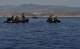 Greek servicemembers gather a sea-rescue kit out of the Mediterranean Sea during Exercise Stolen Cerberus IV near Elefsis Air Base, Greece, April 27, 2017. U.S. Air Force and Army servicemembers trained alongside their Greek partners to conduct these drops for the first time during this fourth iteration of the exercise. As NATO allies, the U.S. and Greece share a commitment to promote peace and stability, and seek opportunities to continue developing their strong relationship. (U.S Air Force photo by Senior Airman Tryphena Mayhugh)