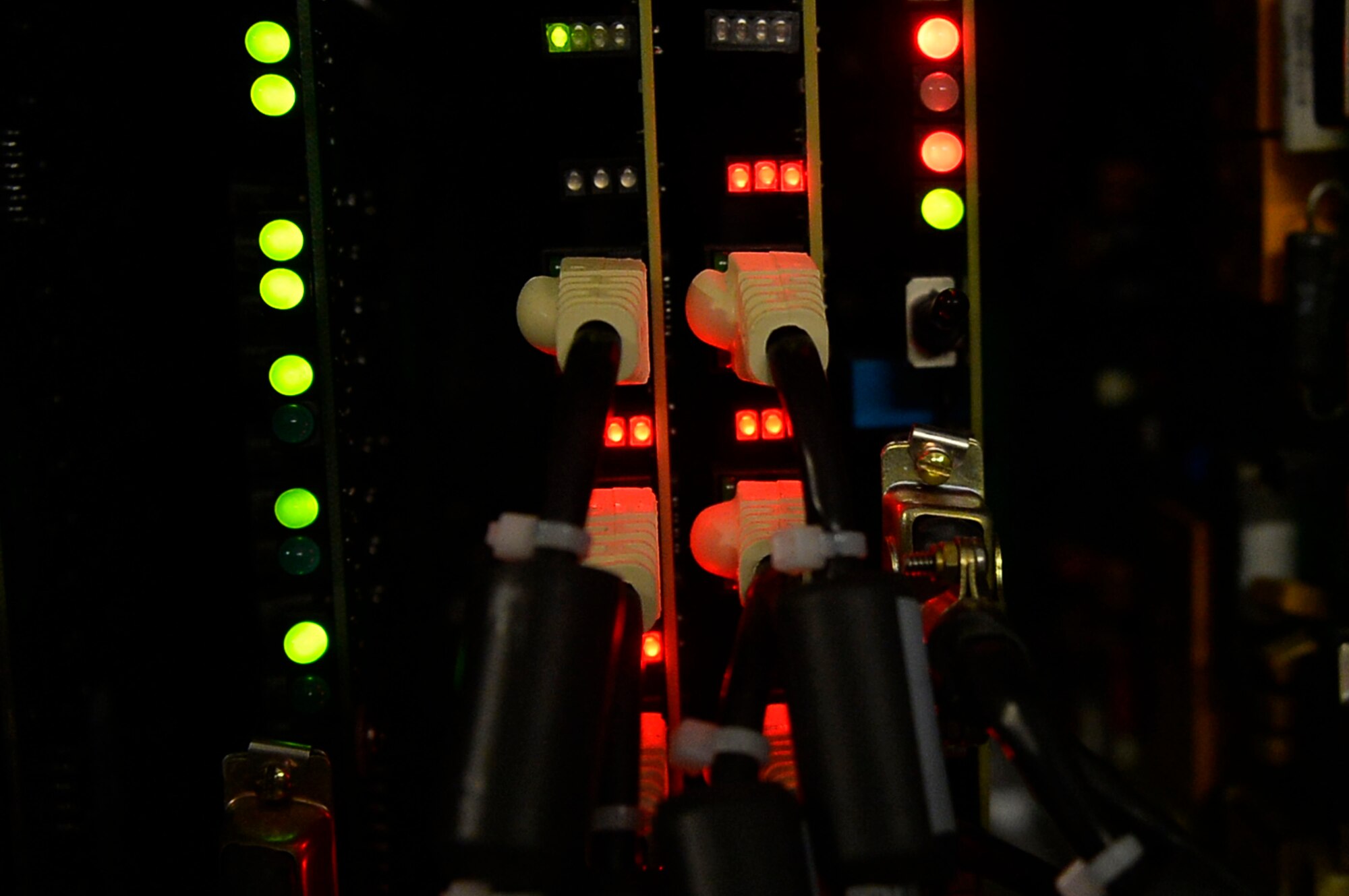 Cables rest in the ports of a communications system on Ramstein Air Base, Germany, April 26, 2017. The 1st Combat Communications Squadron conducted a training exercise featuring the first total force integrated team for U.S. Air Forces in Europe and Air Forces Africa. (U.S. Air Force photo by Airman 1st Class Joshua Magbanua)