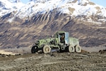 Arizona National Guard Spc. Joseph Charles, a motor vehicle operator with the 259th Engineer Platoon, operates heavy equipment during a runway extension project at Innovative Readiness Training, Old Harbor, Alaska, April 19, 2017. The project will extend the existing Old Harbor runway by 2,700 feet, which will allow larger aircraft to land in Old Harbor. 