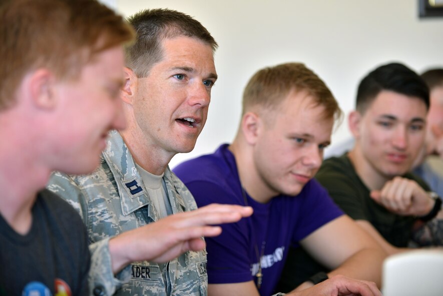 U.S. Air Force Chaplain (Capt.) Lance Schrader, 720th Expeditionary Air Base Squadron chaplain, speaks with Airmen during a spiritual lunch and learn, April 27, 2017, at Diyarbakir Air Base, Turkey. The luncheon was designed to build relationships and bolster camaraderie among U.S. forces. (U.S. Air Force photo by Senior Airman John Nieves Camacho)