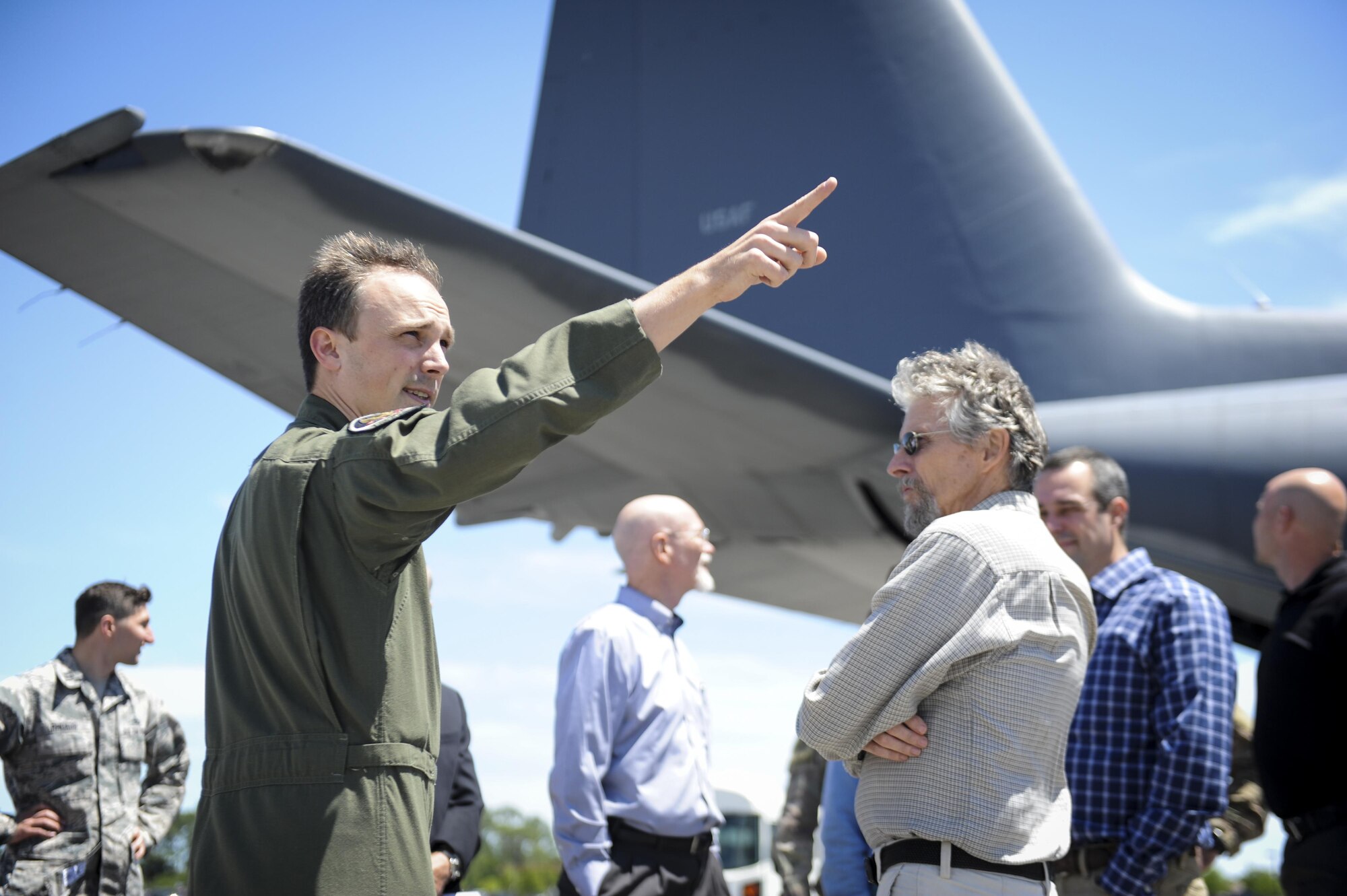 Maj. Harrison Sumerall, with the 15th Special Operations Squadron, describes various aspects of the MC-130 Combat Talon II to a group of local clergymaen at Hurlburt Field, Fla., April 26, 2017. The Hurlburt Field Chapel hosted local clergymen and provided insight to the Air Commando culture and discussed the unique experiences Airmen face. (U.S Air Force photo by Airman 1st Class Dennis Spain)