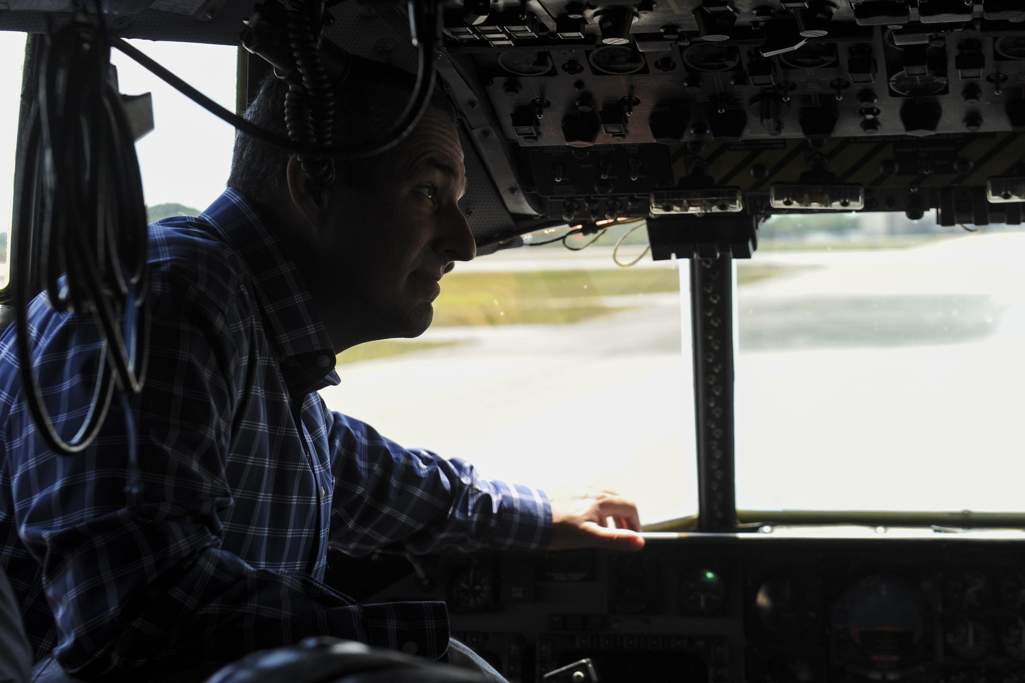 Troy Hamilton, the senior pastor at Rocky Bayou Baptist Church in Niceville, Fla., examines the cockpit of an MC-130 Combat Talon II during a Clergy Day event at Hurlburt Field, Fla., April 26, 2017. Local clergyman participated in a static tour of Hurlburt’s MC-130. The tour participants were briefed on the aircraft’s capabilities, its mission and other various aspects of the aircraft. (U.S. Air Force photo by Airman 1st Class Dennis Spain)