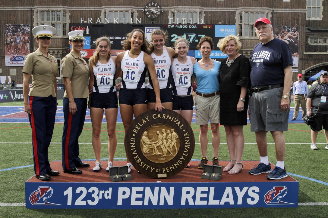 U.S. Marines present awards to the winners of the college women’s 4x800 Champions of America Invitational during the 2017 Penn Relays in Philadelphia, April 29. The winners of the race are from Villanova University. The Penn Relays are the world’s largest relay meet which has drawn crowds over 100,000 strong each year for the last decade.