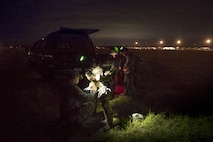Pararescuemen from the 38th Rescue Squadron don parachutes for another jump following static-line jumps, April 24, 2017, at Moody Air Force Base, Ga. All PJs are qualified to conduct both static-line and High altitude, low opening jumps. During a static-line jump, the jumper is attached to the aircraft via the ‘static-line’, which automatically deploys the jumpers’ parachute after they’ve exited the aircraft. (U.S. Air Force photo by Staff Sgt. Ryan Callaghan)