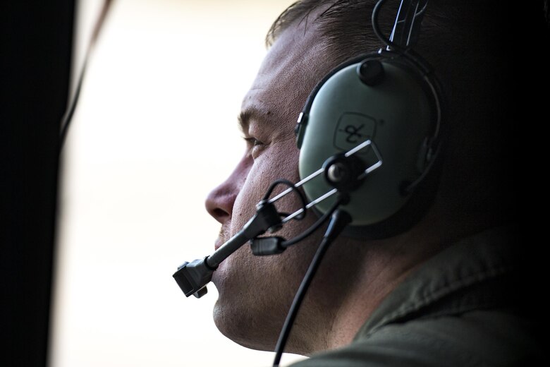 Staff Sgt. Phillip Palmer, 71st Rescue Squadron loadmaster, waits for takeoff inside an HC-130J Combat King II, April 24, 2017, at Moody Air Force Base, Ga. Aircrew members work closely with pararescuemen when conducting jumps. (U.S. Air Force photo by Staff Sgt. Ryan Callaghan)