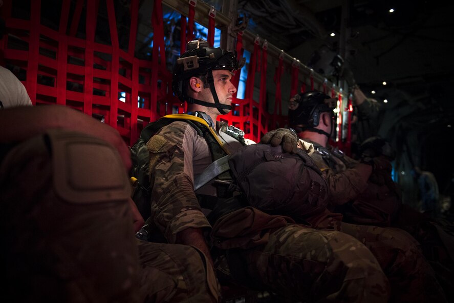 Senior Airman Matt, 38th Rescue Squadron pararescueman, rides in the back of an HC-130J Combat King II prior to conducting static-line jumps, April 24, 2017, over Moody Air Force Base, Ga. All PJs are qualified to conduct both static-line and High altitude, low opening jumps. During a static-line jump, the jumper is attached to the aircraft via the ‘static-line’, which automatically deploys the jumpers’ parachute after they’ve exited the aircraft. (U.S. Air Force photo by Staff Sgt. Ryan Callaghan)
