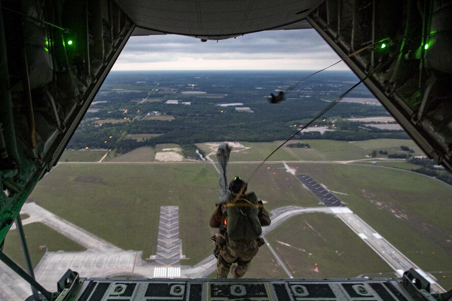 Senior Airman Matt, 38th Rescue Squadron pararescueman, jumps from an HC-130J Combat King II, April 24, 2017, at Moody Air Force Base, Ga. All PJs are qualified to conduct both static-line and High altitude, low opening jumps. During a static-line jump, the jumper is attached to the aircraft via the ‘static-line’, which automatically deploys the jumpers’ parachute after they’ve exited the aircraft. (U.S. Air Force photo by Staff Sgt. Ryan Callaghan)