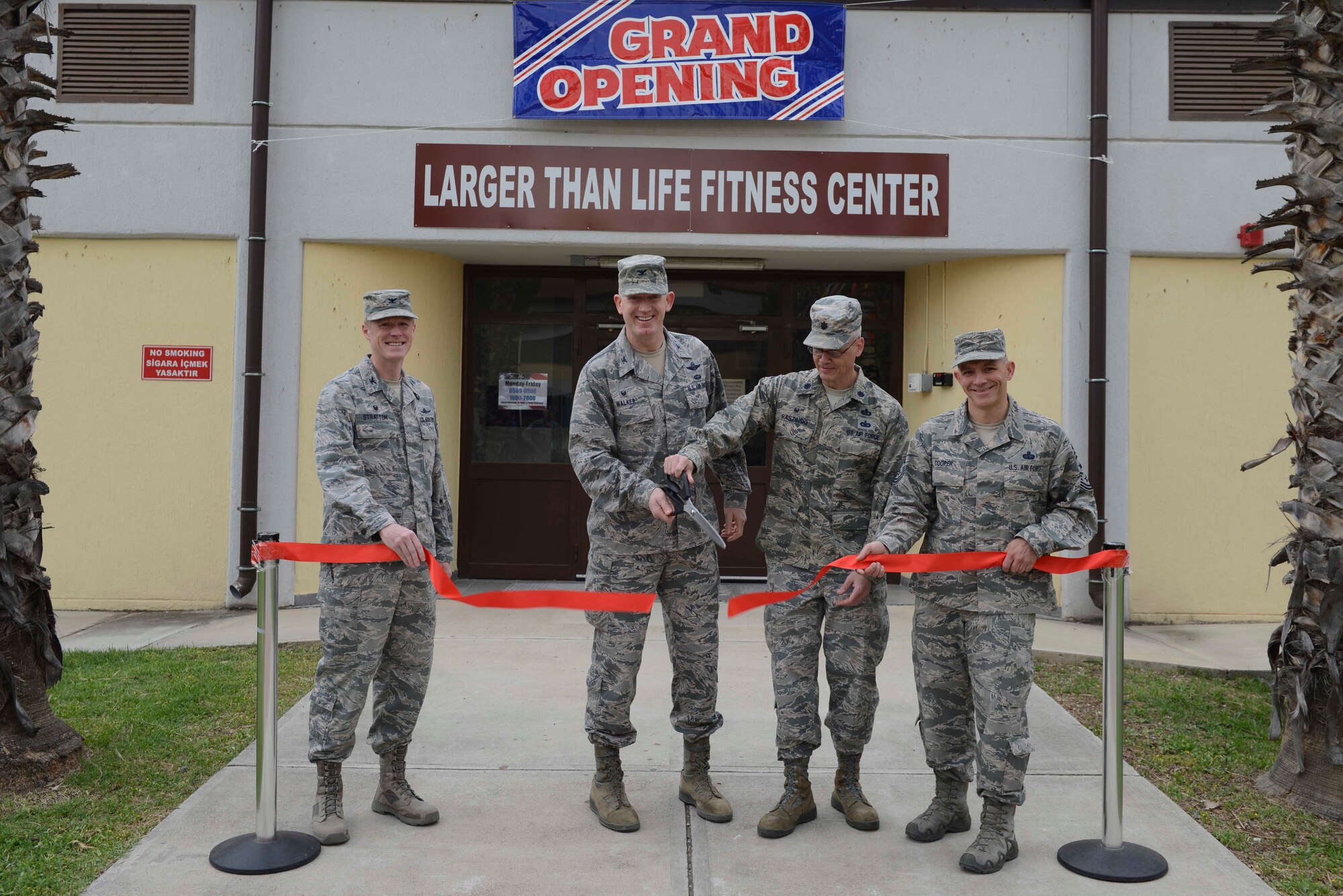 U.S. Air Force Col. Todd Straton, 39th Mission Support Group commander (Left), Col. John Walker, 39th Air Base Wing commander (second from left), Lt. Col. Kenneth Raszinski, 39th Force Support Squadron commander (second from right) and Command Chief Master Sgt. Thomas Cooper, cut the ribbon at the grand opening of the Larger Than Life Fitness Center May 1, 2017, at Incirlik Air Base, Turkey. The facilities were opened to reduce the amount of foot traffic in the base’s main fitness and dining facilities. (U.S. Air Force photo by Airman 1st Class Devin M. Rumbaugh)