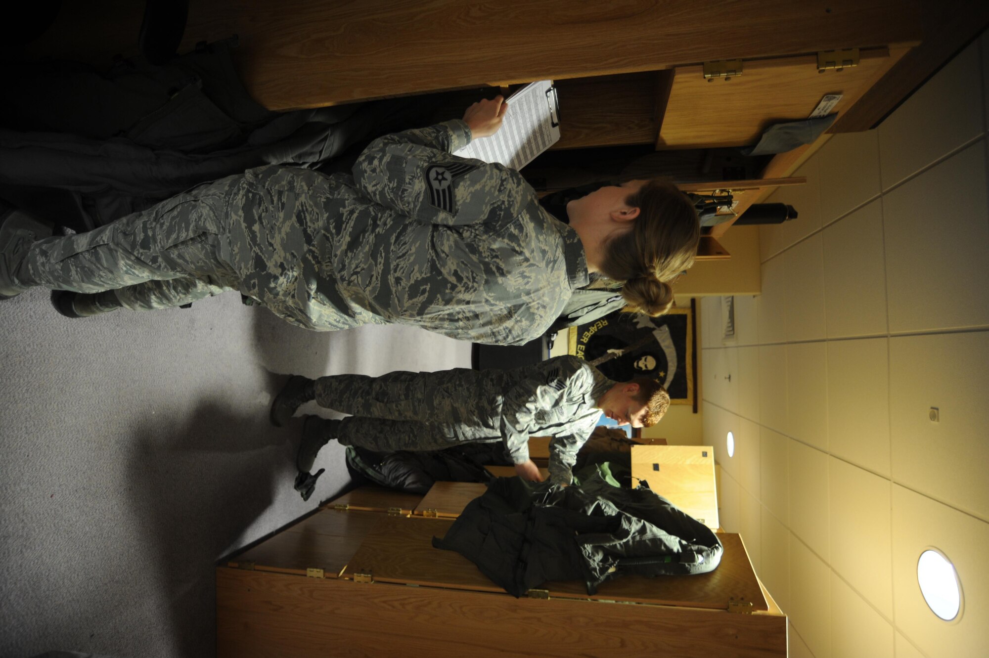 Staff Sgt. Bruce Gjetley, 388th Operations Support Squadron Aircrew Flight Equipment, and Staff Sgt. Samantha Barlond, assigned to the 493rd Aircrew Flight Equipment, prepare and inspect an F-35A and F-15C pilots’ flight equipment prior to a sortie at Royal Air Force Lakenheath. Gjetley and about 215 other Airmen from the 388th and 419th Fighter Wings are deployed to Europe for training with units from the U.S. Air Force, Royal Air Force and air forces from other NATO Allies. The 34th Fighter Squadron has been sharing facilities with the 493rd Fighter Squadron, which flies the F-15C. (U.S. Air Force photo/Micah Garbarino)