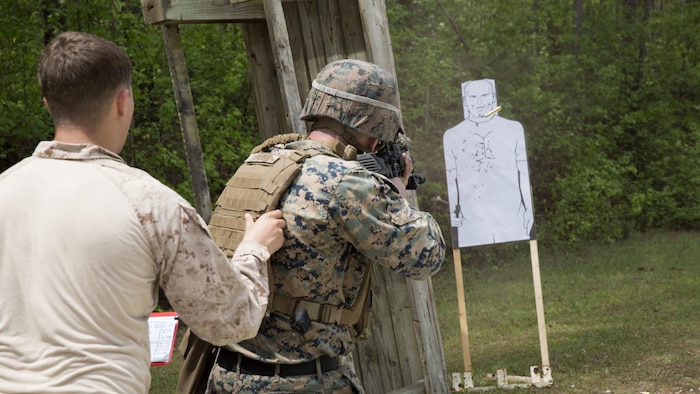 A Marine instructor directs a student to fire blank rounds at a stationary target during a sniper course at Marine Corps Base Camp Lejeune, N.C., April 19, 2017. The Expeditionary Operations Training Group ran the course to teach long-range precision marksmanship to Marines from different units. The students are with the 2nd Reconnaissance Battalion and the battalion landing team with the 26th Marine Expeditionary Unit.