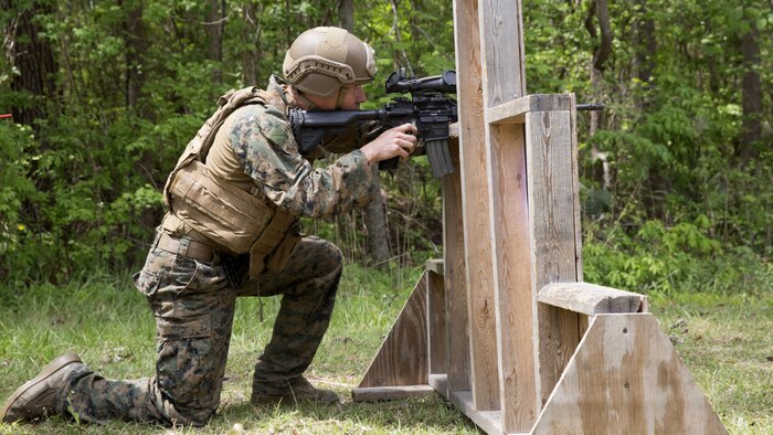 A Marine conceals himself as he sights in on his target during a sniper training course at Marine Corps Base Camp Lejeune, N.C., April 19, 2017. The Expeditionary Operations Training Group ran the course to teach long-range precision marksmanship to Marines from different units. The students are with the 2nd Reconnaissance Battalion and the battalion landing team with the 26th Marine Expeditionary Unit.