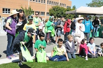 Students from local schools adamantly listen to a speech given during the 63d Regional Support Command Earth Day event held at the Sergeant James Witkowski Armed Forces Reserve Center in Mountain View.