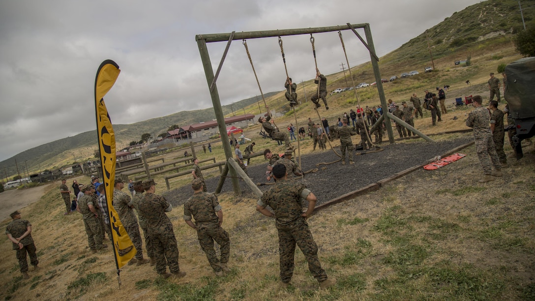 U.S. Marine Corps Reconnaissance Challenge competitors climb up the ropes on the obstacle course during the 9th annual Reconnaissance Challenge on Marine Corps Base Camp Pendleton, California, April 27, 2017. The Reconnaissance Challenge is a memorial event held to honor fallen recon Marines. The challenge consisted of 24 miles of hiking, helocasting, scout swimming, memory challenge, obstacle course, close quarters tactics, live-fire range and two pool stations.